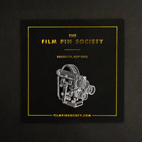 16mm Film Camera Enamel Pin on backing card