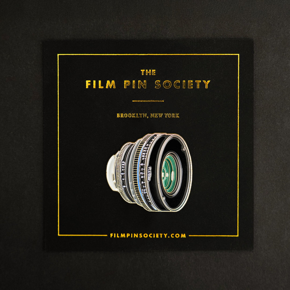 35mm Lens Enamel Pin on backing card
