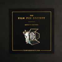 4K HMI Light Enamel Pin on backing card