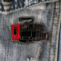80s VHS Camera Enamel Pin on a jacket
