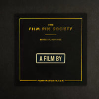 A Film By Credit Enamel Pin on backing card