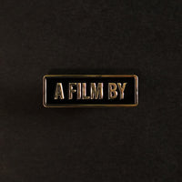 A Film By Credit Enamel Pin front