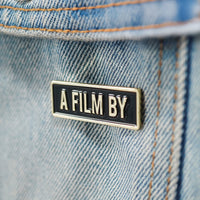 A Film By Credit Enamel Pin worn