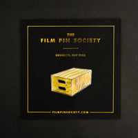 Apple Box Enamel Pin on backing card