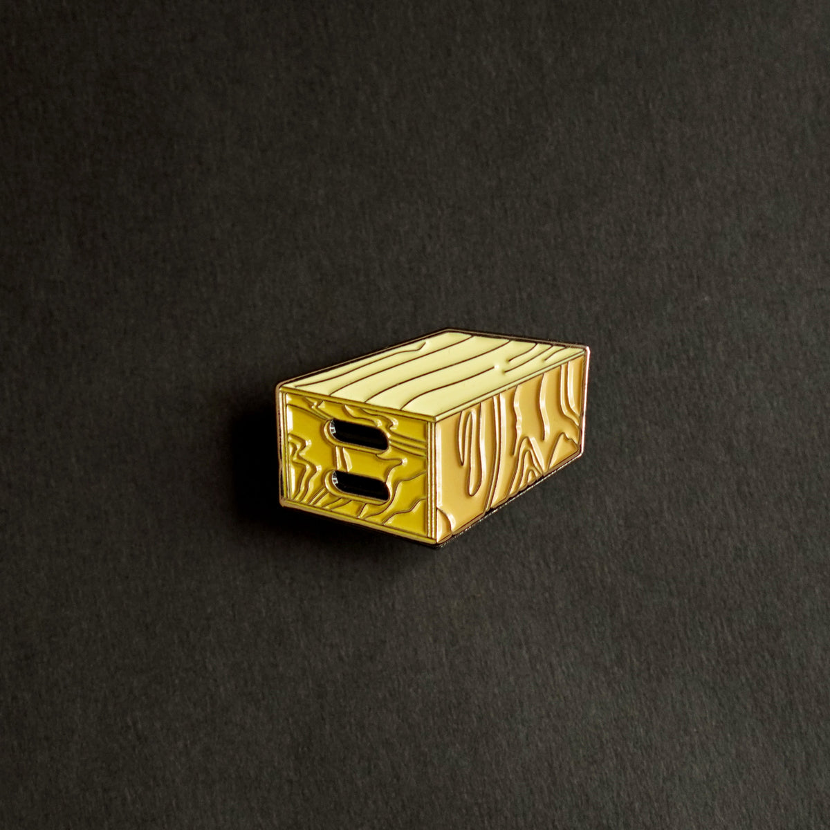 Apple Box Enamel Pin front