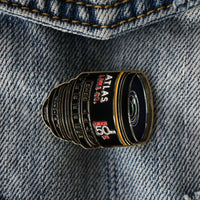50mm Atlas Anamorphic Lens Enamel Pin on a jacket