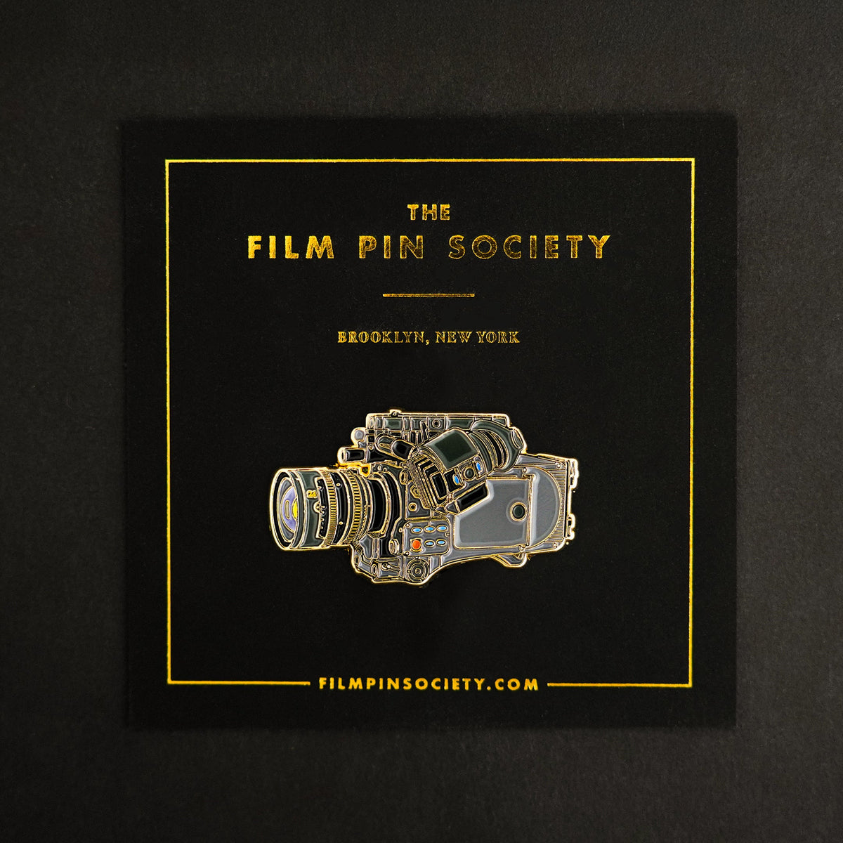 Cine Camera Enamel Pin on backing card