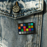Color Chart Enamel Pin on a jacket