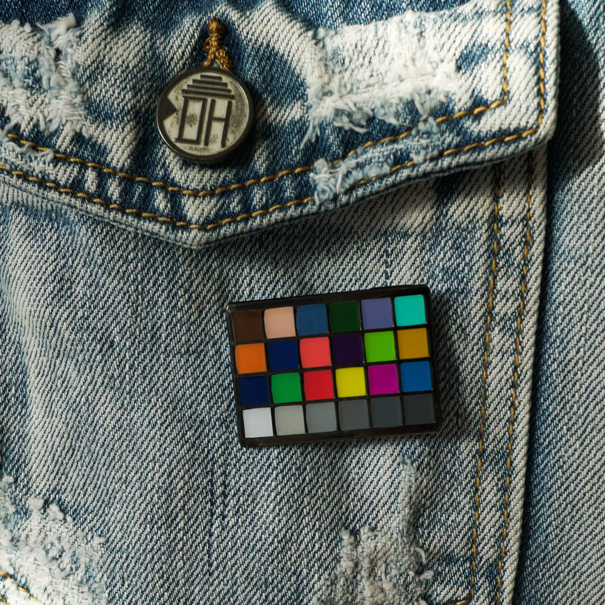 Color Chart Enamel Pin on a jacket