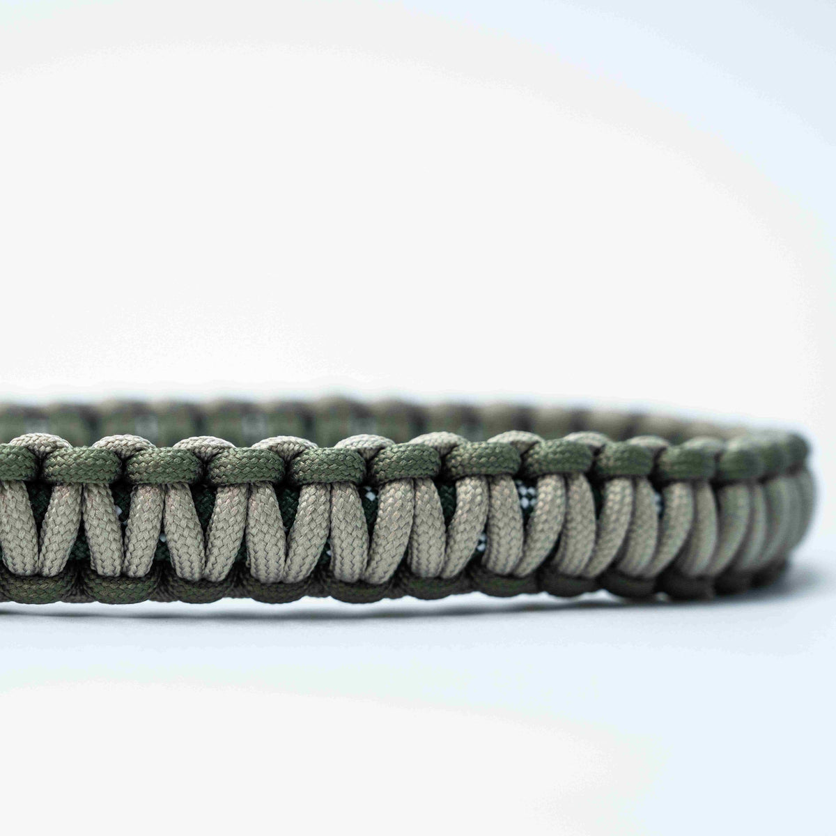 Woven crossbody strap PRO shown coiled