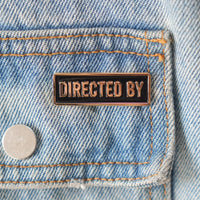 Directed By Credit Enamel Pin on a jacket
