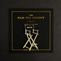 Director's Chair Enamel Pin on backing card