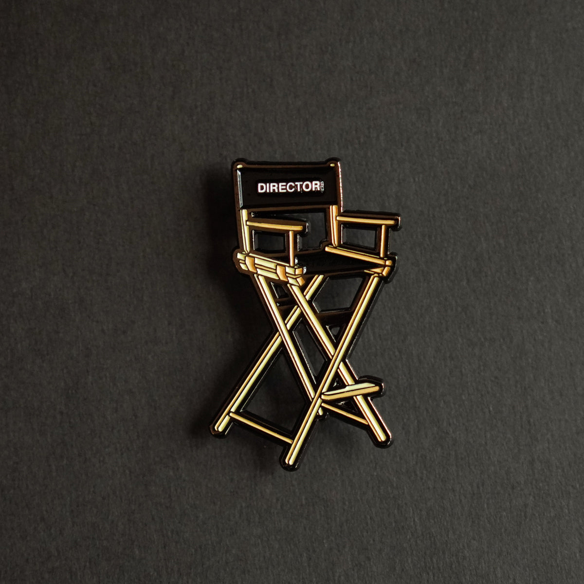 Director's Chair Enamel Pin front