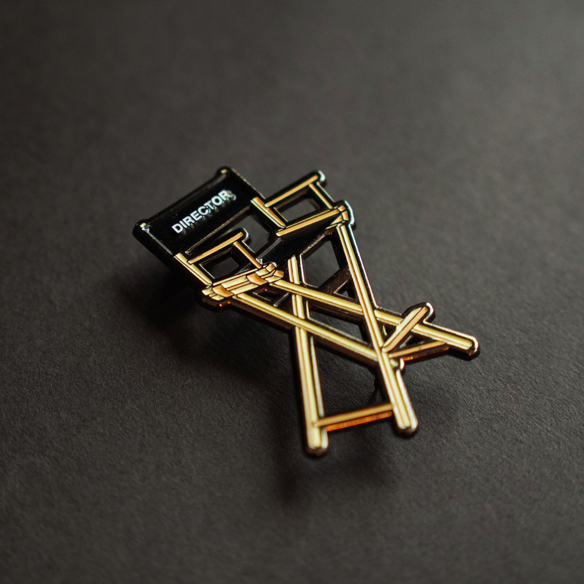 Director's Chair Enamel Pin side