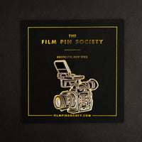 Doc Camera Enamel Pin on backing card