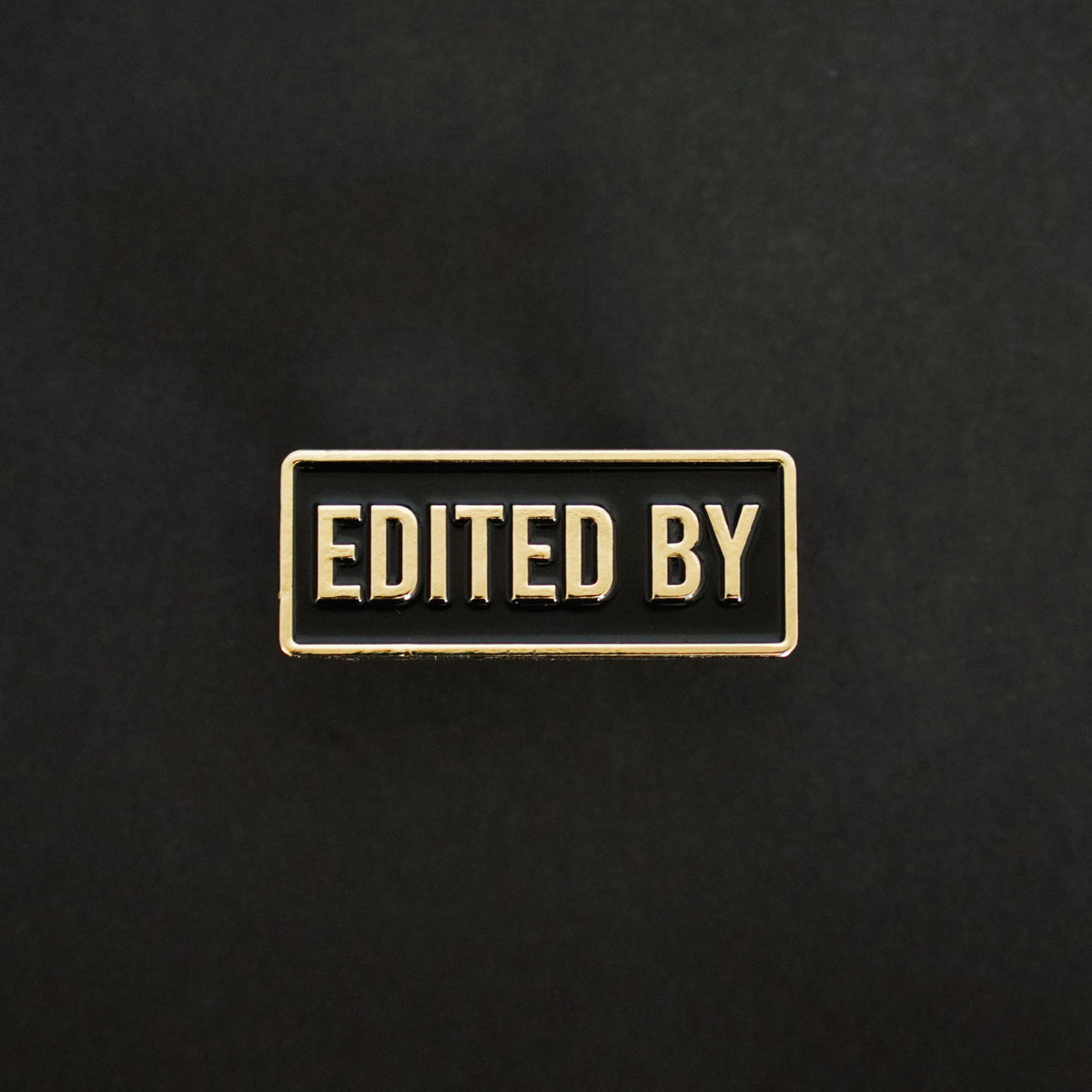 Edited By Credit Enamel Pin front