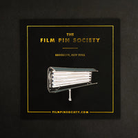 Fluorescent Light Enamel Pin on backing card