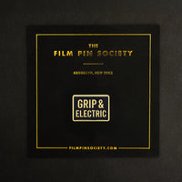 Grip & Electric Department Enamel Pin on backing card