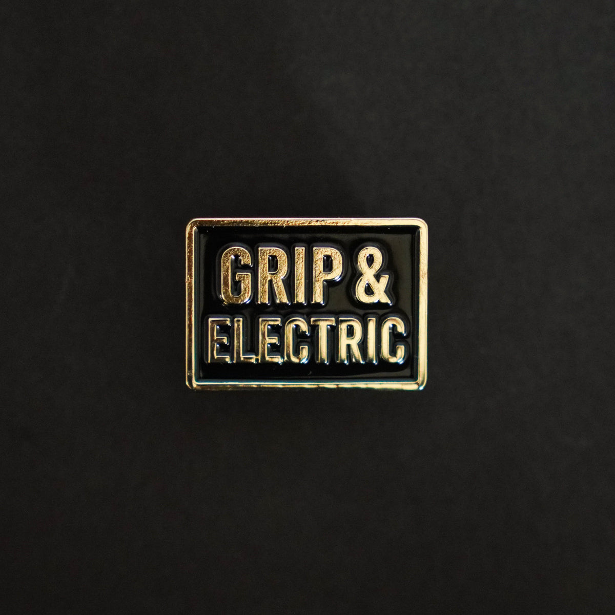 Grip & Electric Department Enamel Pin front