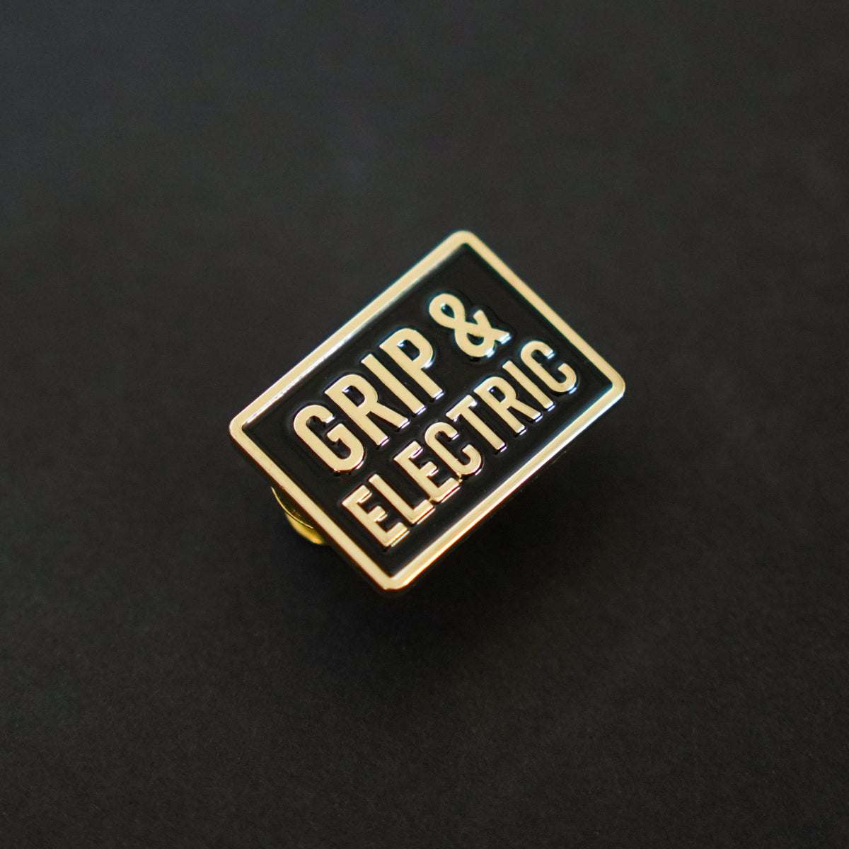 Grip & Electric Department Enamel Pin side