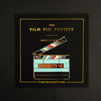 Jumbo Timecode Slate Enamel Pin on backing card