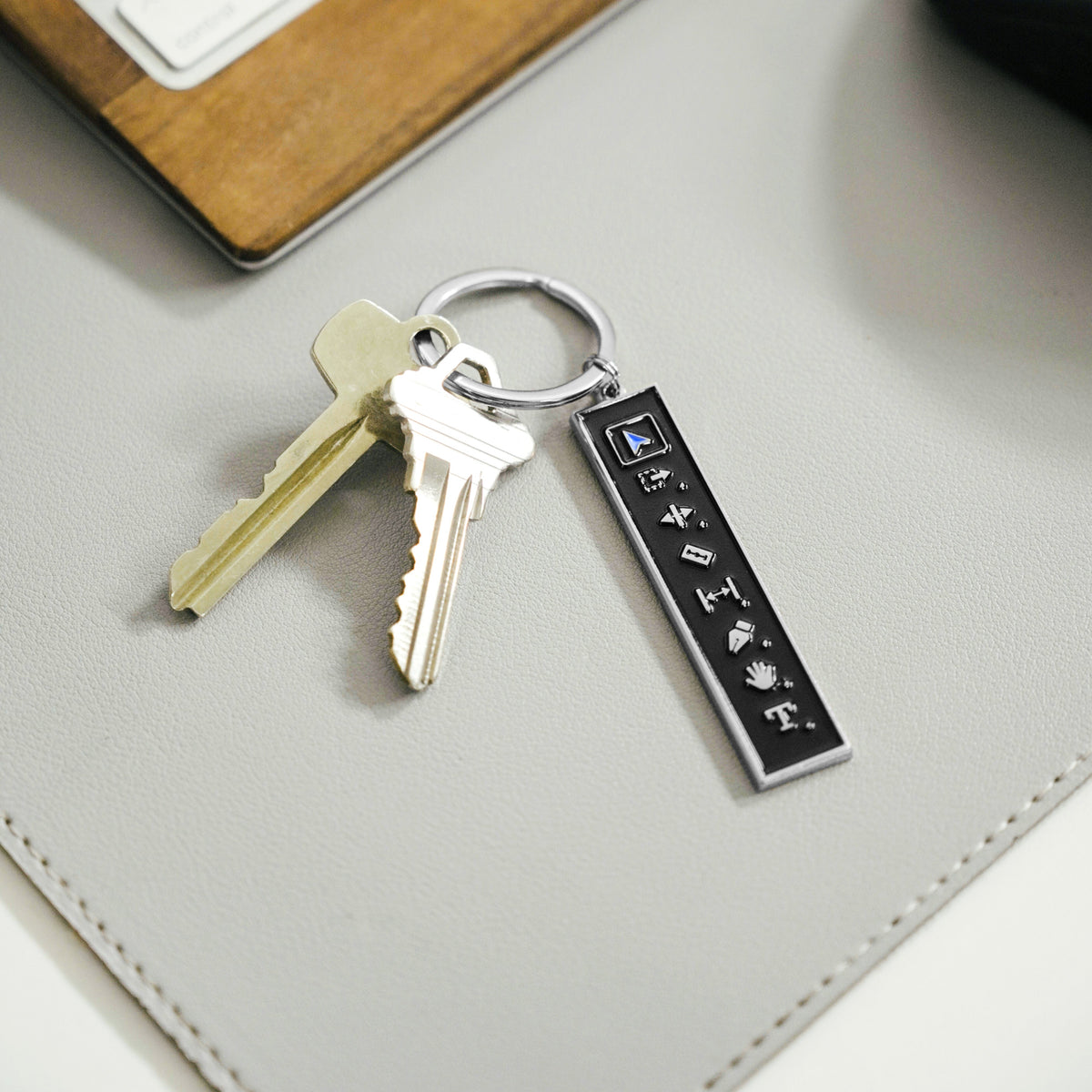 Editor's Toolbar Keychain on a desk