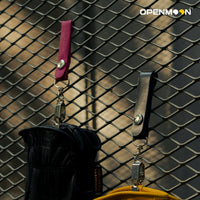 OpenMoon glove clip worn on a work belt