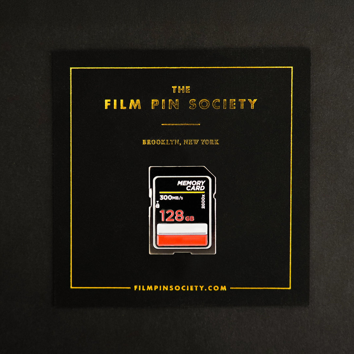 Memory Card Enamel Pin on backing card