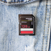 Memory Card Enamel Pin on a jacket