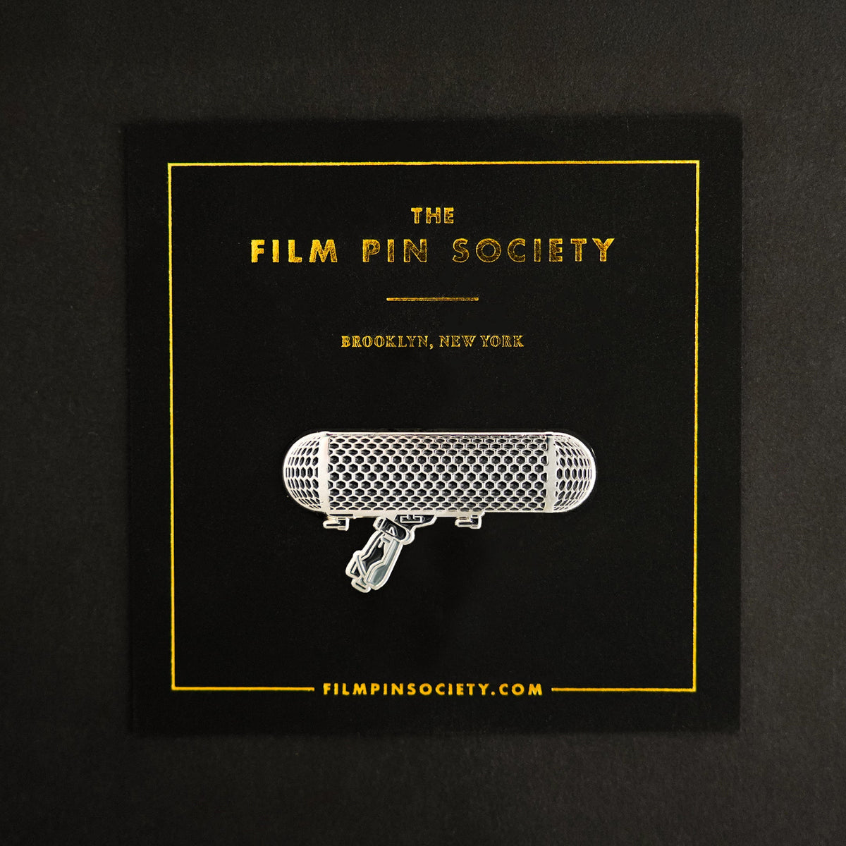 Microphone Enamel Pin on backing card