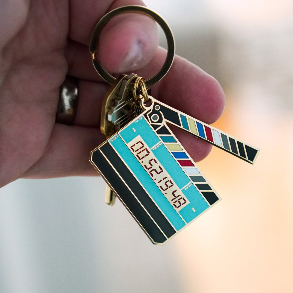 Timecode Slate Keychain in hand