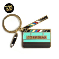 Timecode Slate Keychain glowing in the dark