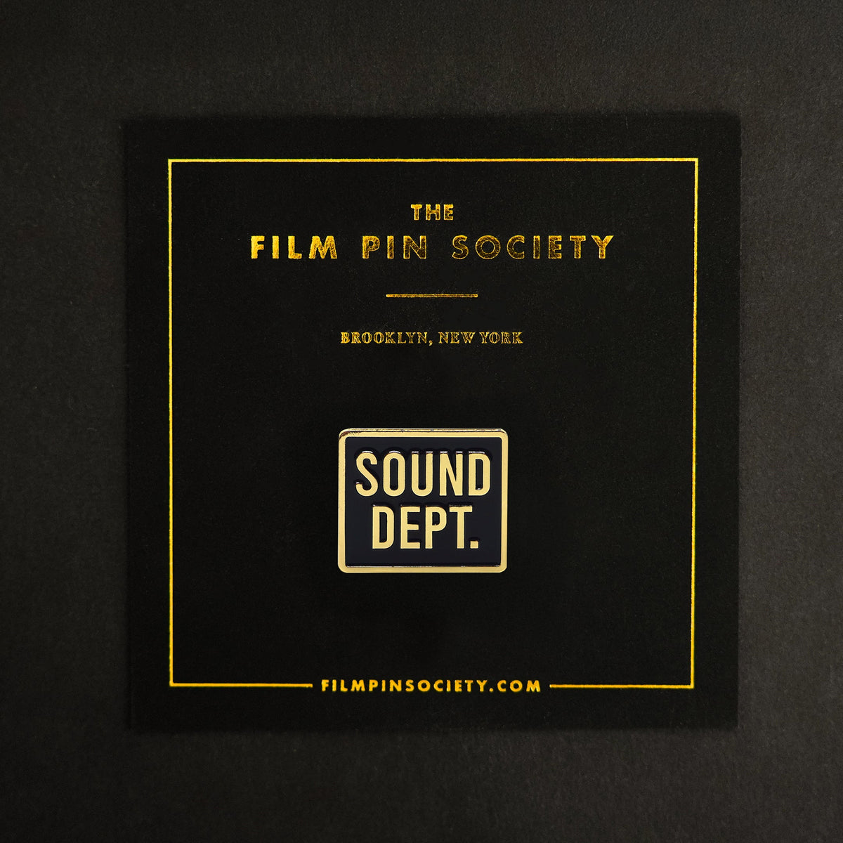 Sound Department Enamel Pin on backing card