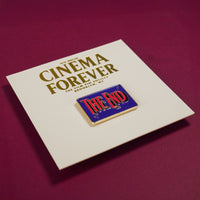 The End Credit Enamel Pin on backing card