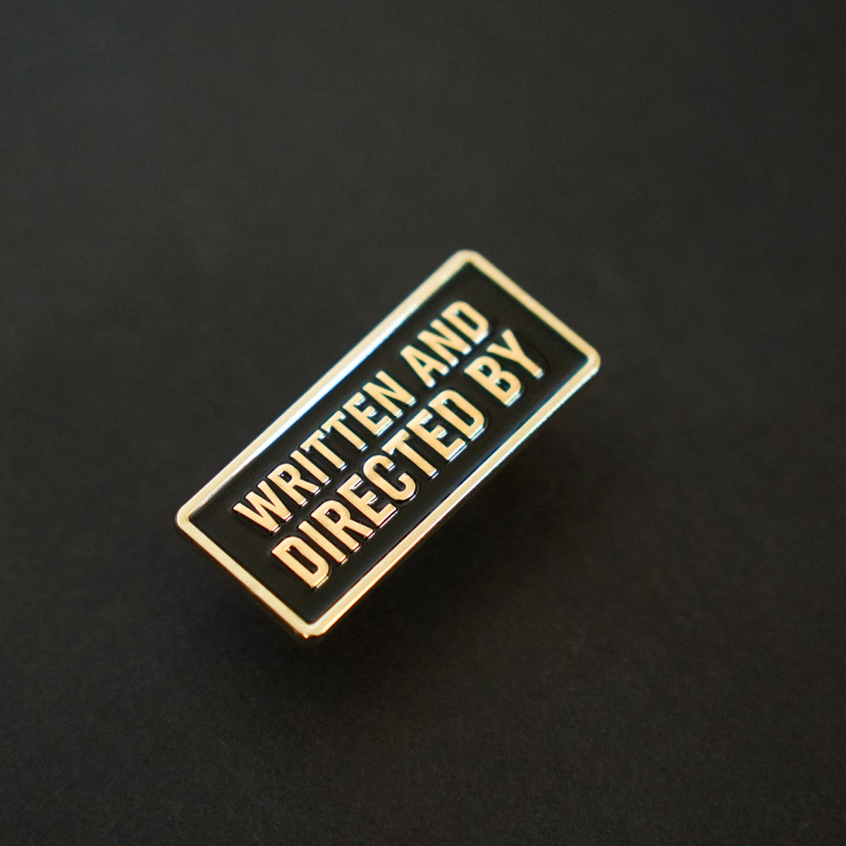 Written and Directed By Credit Enamel Pin side