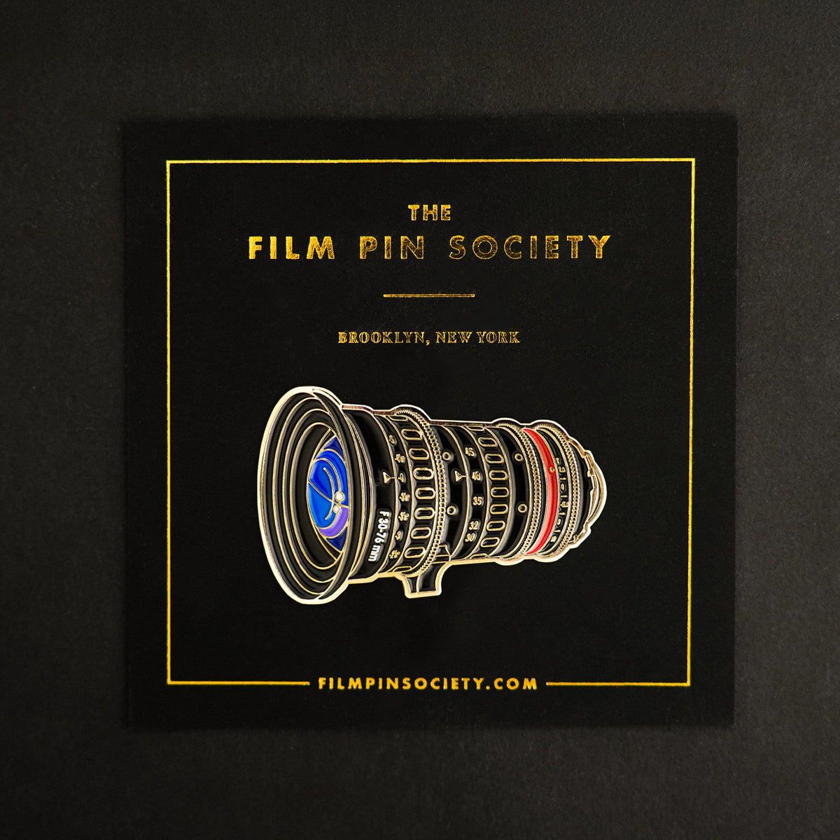 Cine Zoom Lens Enamel Pin on backing card